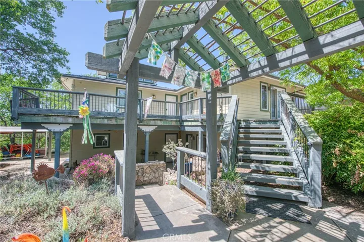 Access to the Apt and the lower stairs patioe area, garage and shop area.
