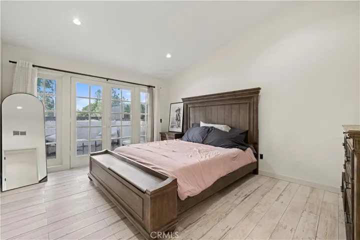 Primary with French doors and patio area