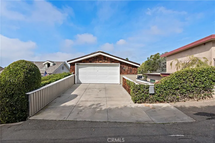 2-Car Garage and Driveway (plus one side parking)