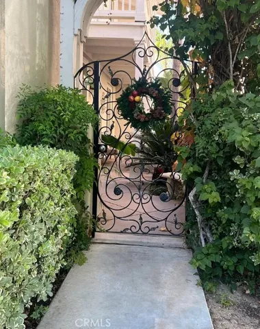 Beautiful iron gate entrance to courtyard.
