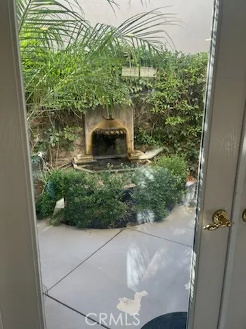 Charming water feature just off of living room through french doors!