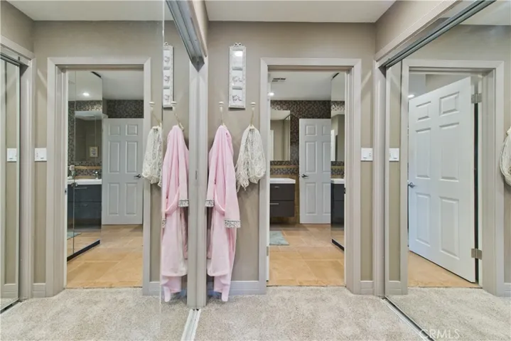 2 primary closets, one on each side (mirrored)