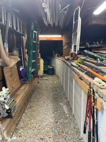 Covered storage under driveway