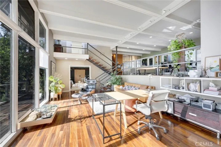 living room with a huge bedroom straight ahead