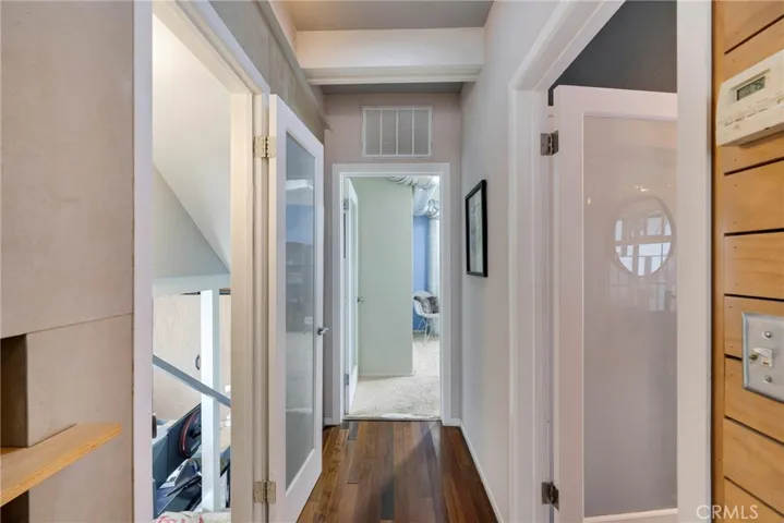 entry level -leading into bathroom and #1 bedroom