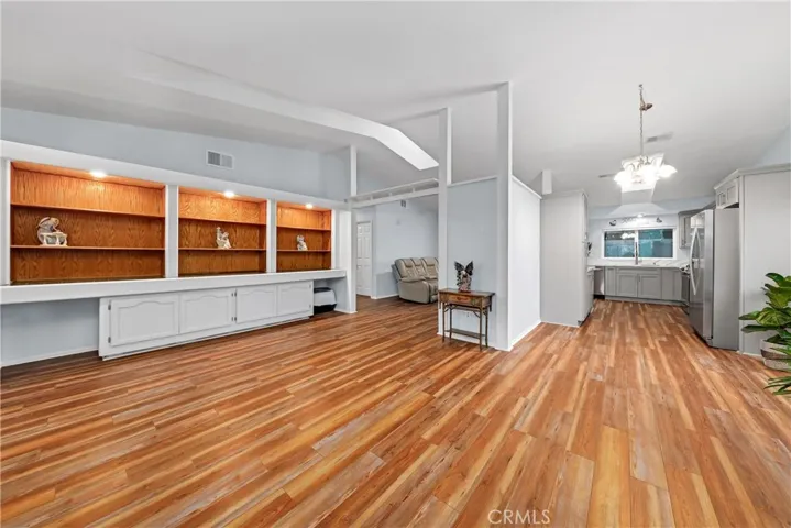 Open Concept Living Room, Formal Dining Room & Kitchen.