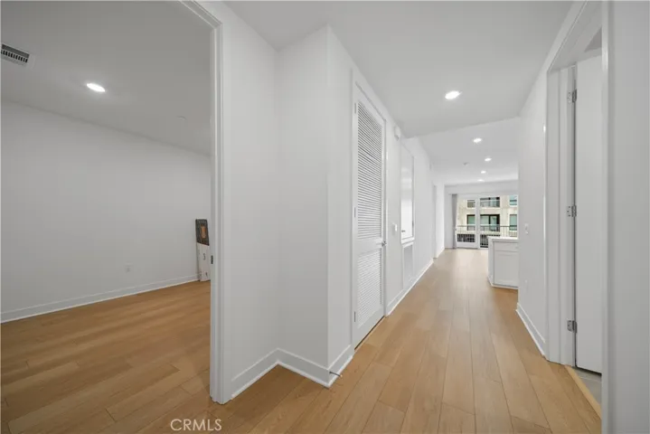 When you come in ,you can see the 3rd bedroom/work office in left,go ahead to livingroom.Public area floor install ed vinyl floor.