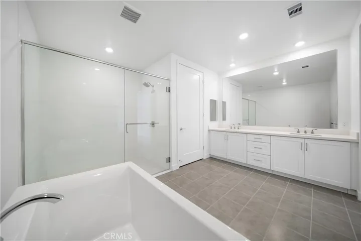 Master bathroom with tub ,shower ,toilet.