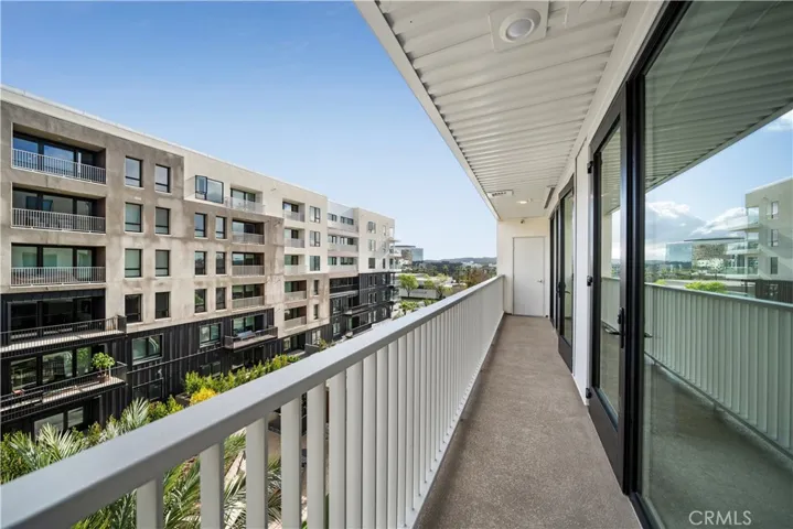Long balcony connect with living area and 2nd bedroom