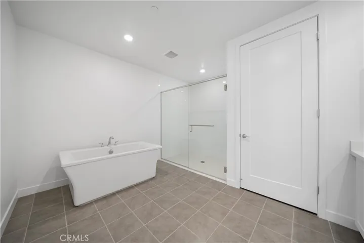 Master bathroom with tub ,shower ,toilet.