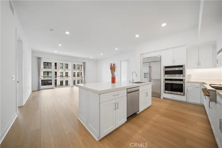 Large open kitchen with brand new dish wash, fridge,oven,micowave and cabinets.
