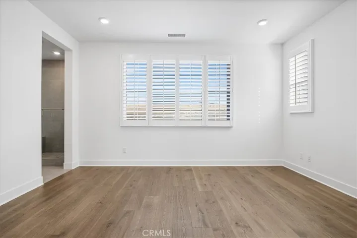 View of primary bedroom window facing rear yard.