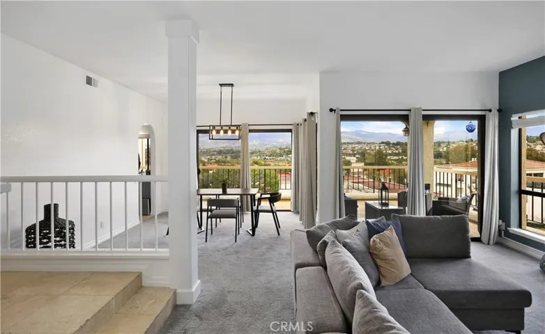 Front Entry has travertine tile floor and is spacious open floor plan