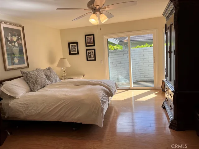 Master bedroom with sliding glass doors to private patio