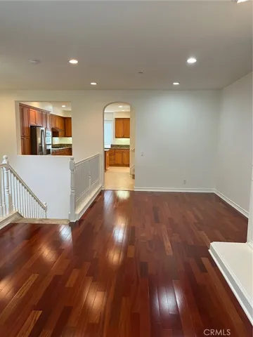 Main floor living and dining room looking toward kitchen