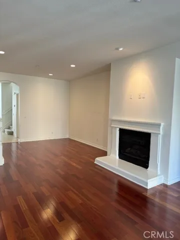 Living room features a cozy fireplace