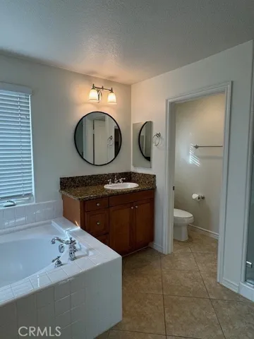 Separate soaking tub