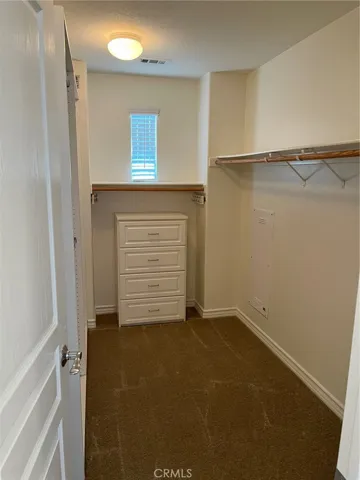 Primary ensuite walk-in closet