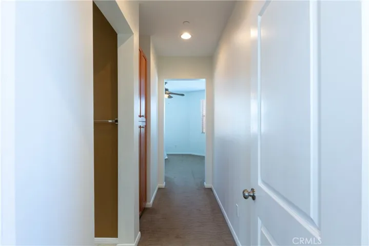Entrance to main bedroom with plenty of storage