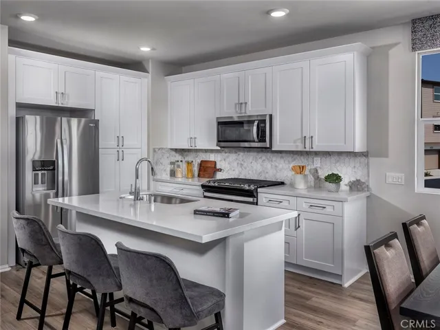 Photo is not of the actual home, but is an inspirational photo of builder’s model home and may depict options, furnishings, and/or decorator features that are not included