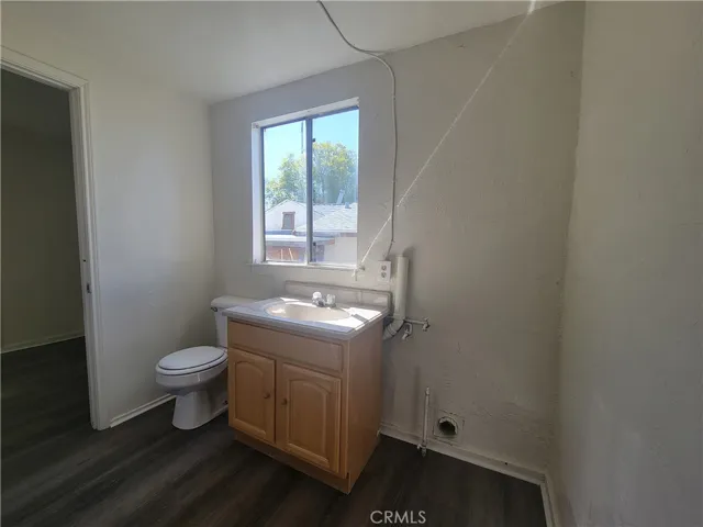 front unit half bathroom with laundry hookup