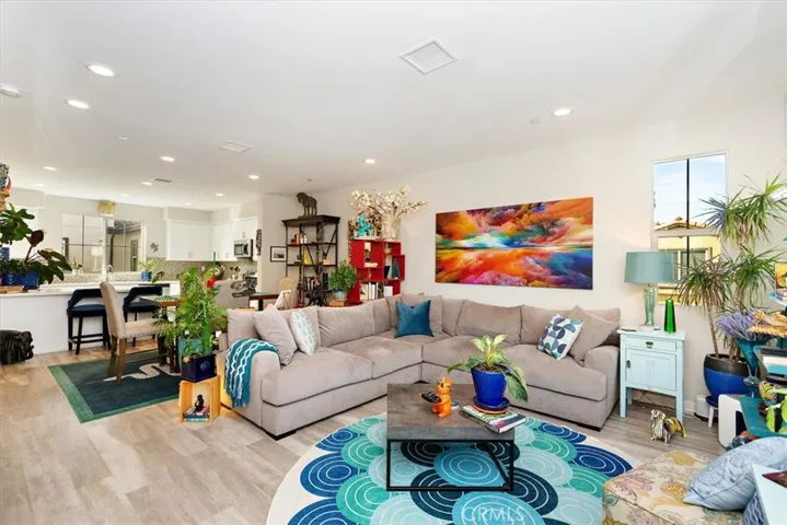 Second floor, living room and kitchen.