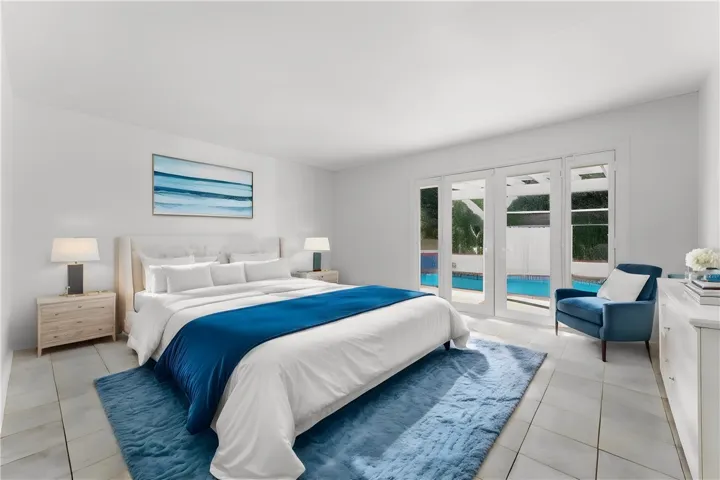 Downstairs primary bedroom, virtually staged.