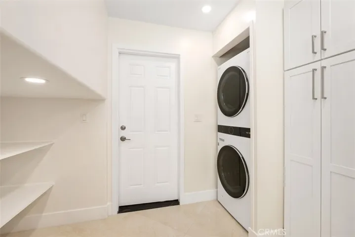 LG Wash-Tower in Kitchen and a Set of Washer /Dryer Upstairs!