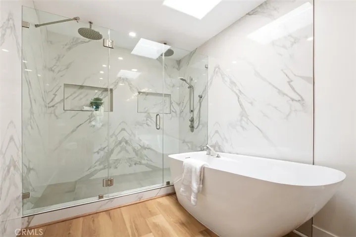 Double shower, and Italian Tile and Slabs!