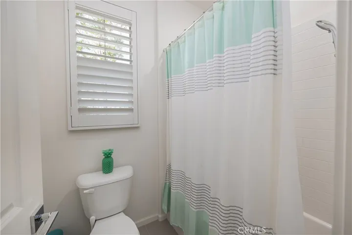 Guest bathroom with separate toilet and shower room.