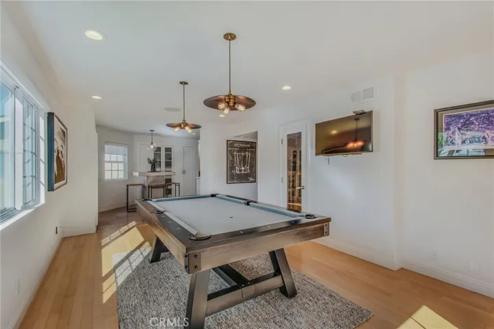 Formal Dining Room currently used as differently. Temperature Controlled Wine Room on the Left.