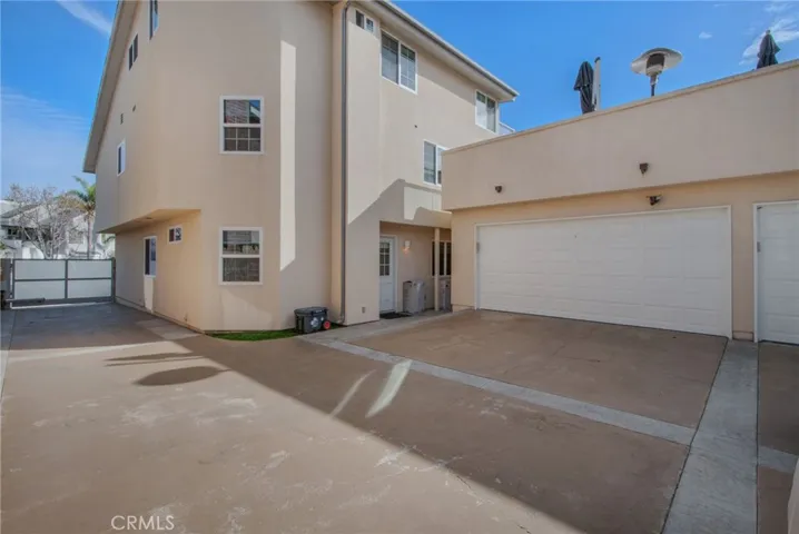 Gated and Extended Driveway leads to Private 3 Car Garage