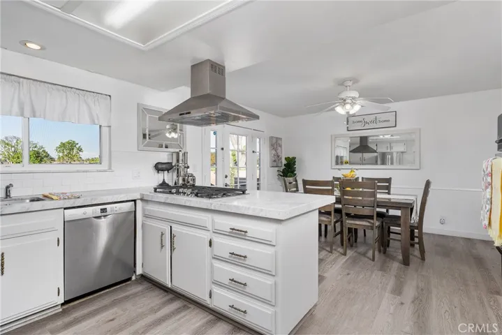kitchen open to casual dining area