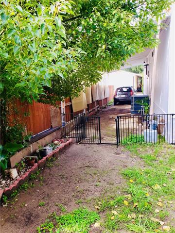 View from the backyard to the carport