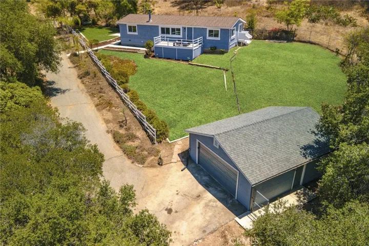 Front of house, oversized garage and private driveway.  Lots of space for vehicles.