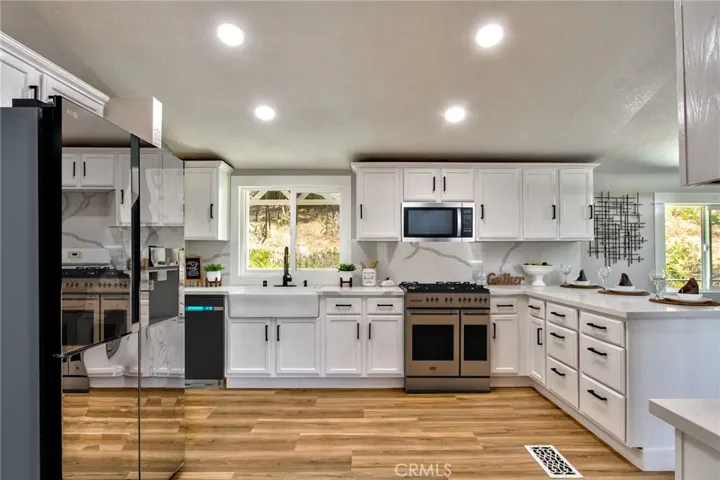 Kitchen with stainless steel appliances all included with the sale.  Less than 1 year old.