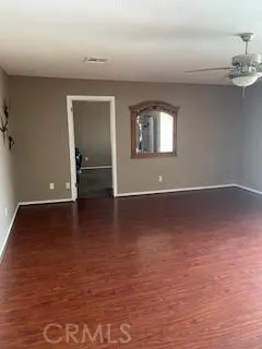Den lower level with bedroom adjaent