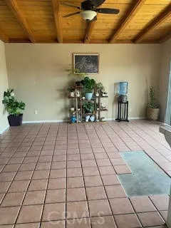 Family room with wood beamed ceilings