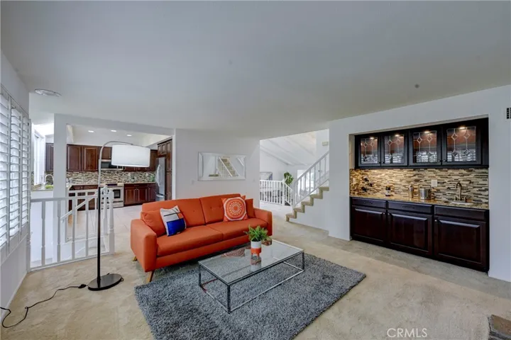 Spacious lighted wet bar for easy entertaining.