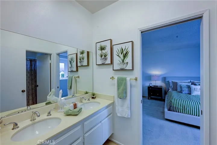 Upstairs Jack n Jill bath with dual sinks.