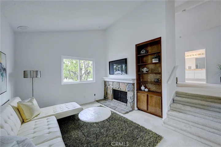 Primary retreat also has built in cabinetry and is just steps from the ensuite bedroom.