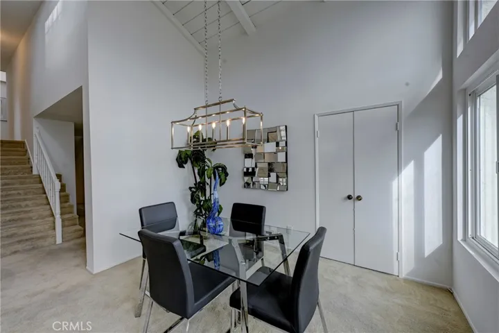 The doors in the formal dining room lead to the kitchen for easy entertaining.