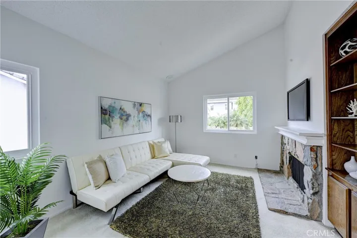 Primary bedroom retreat with rock gas starter fireplace with mantle and hearth!