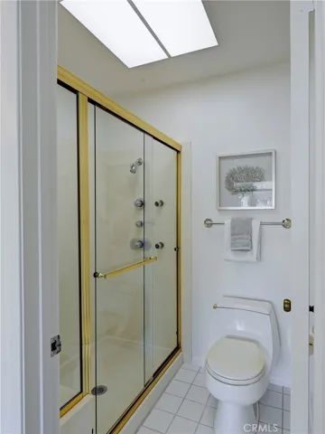 Primary bath with private walk in shower and toilet