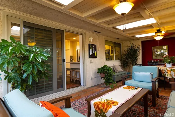 Covered patio with skylites, fans, headers - like an extra room!