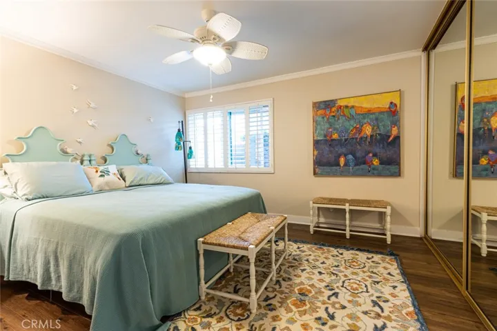 Second bedroom with mirrored sliding closet doors