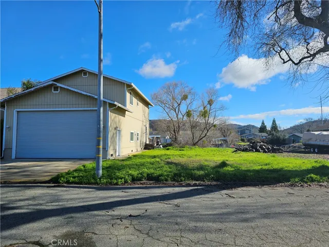 Front of Home and Adjacent Parcel