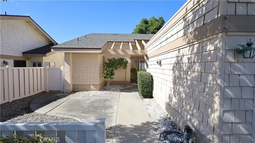 Courtyard leading to front door.