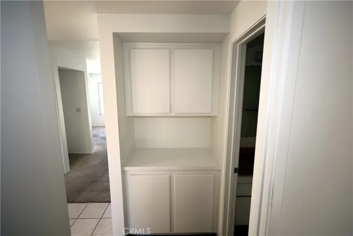 Linen cabinets off Guest Bathroom.