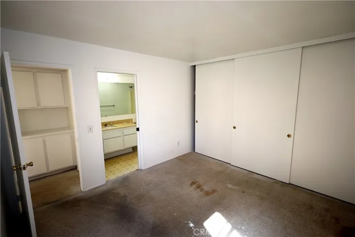 Bedroom 2: pocket door to guest bathroom.